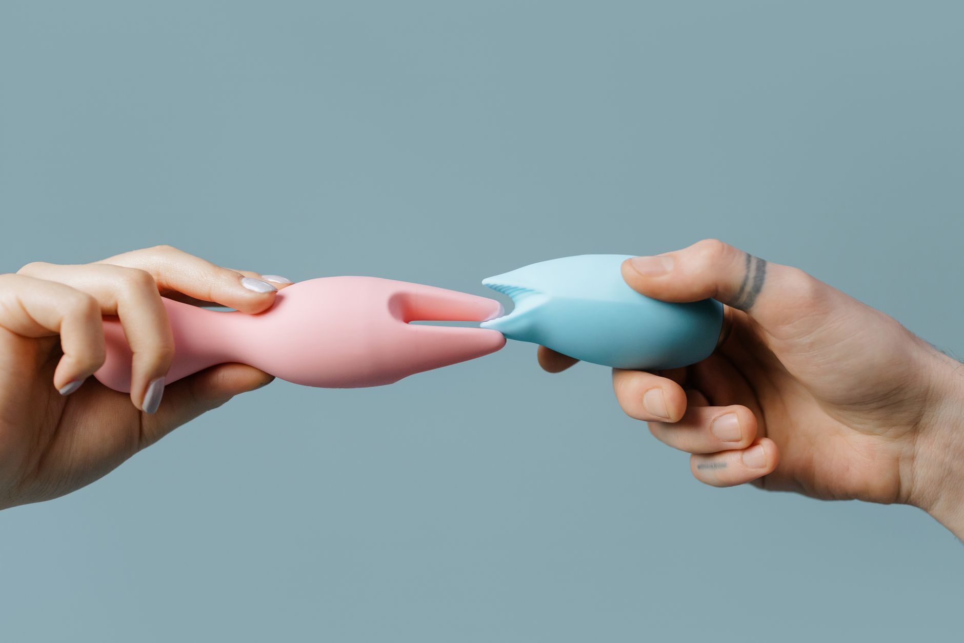Array of vibrant clitoral vibrators and intimate wellness toys displayed in close-up